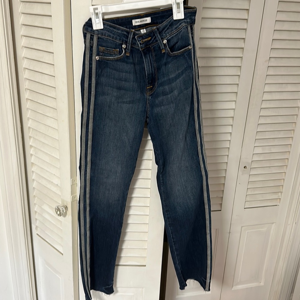 Good American blue, flare, jeans. Detailing down the sides.